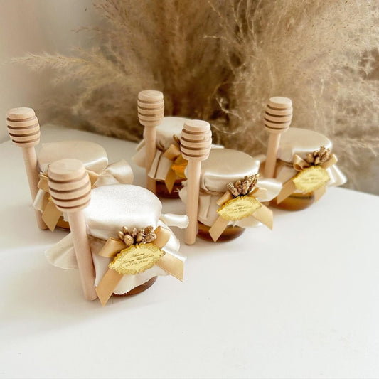 Pot de Miel Orient avec fleurs dorées artificielles et gravure arabesque en plexiglas dorée